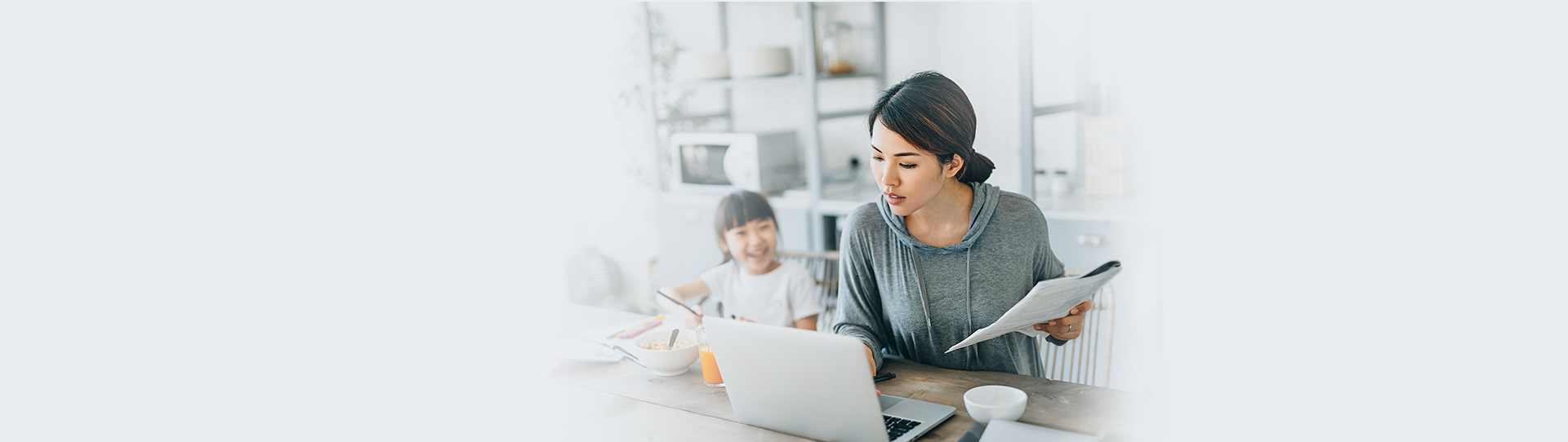 Woman looking at laptop